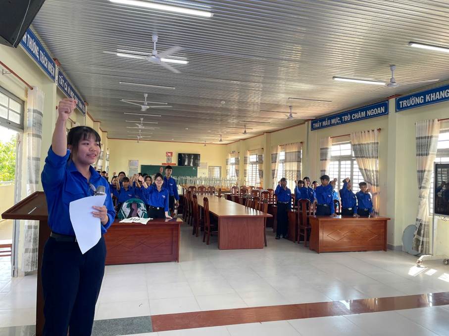 ''A person raising her fist in a room with a group of people

AI-generated content may be incorrect.''