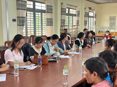 ''''''''A group of people sitting at a table

AI-generated content may be incorrect.''''''''