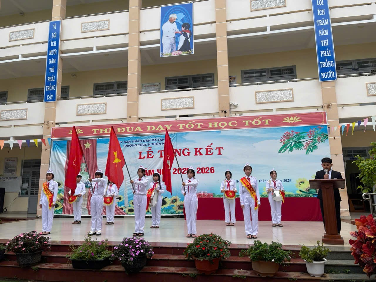 ''''''A group of people in white uniforms on a stage
AI-generated content may be incorrect.''''''